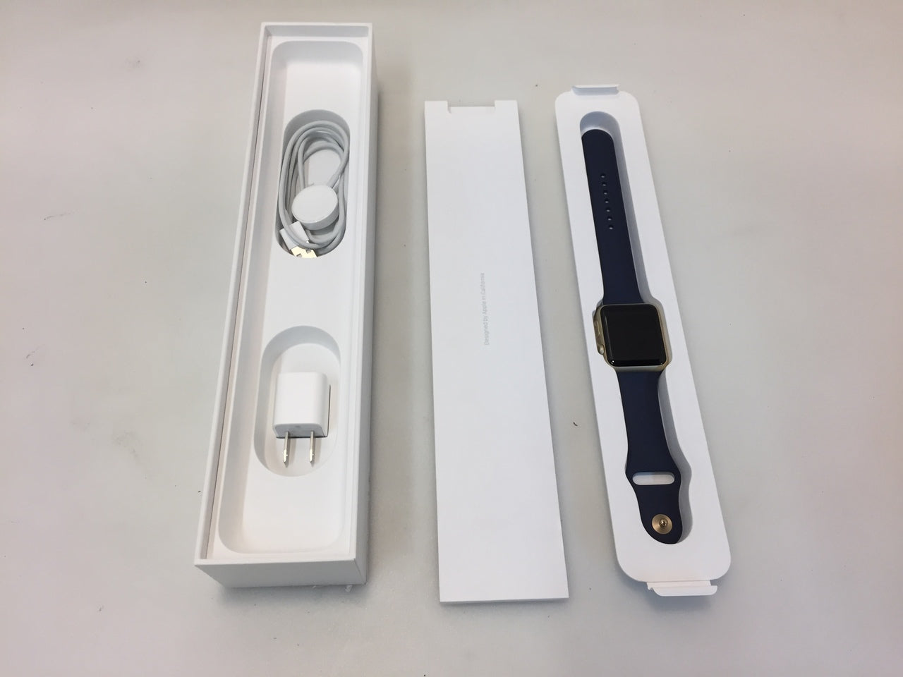 Apple watch series 2 42mm gold aluminum case with on sale midnight blue sport band